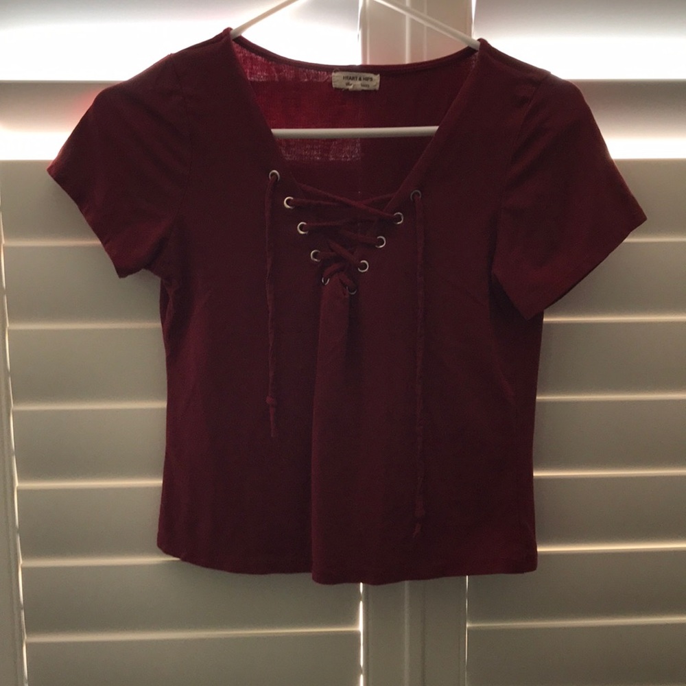 Dark maroon shirt w/ laces in front to tie